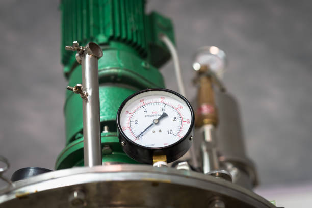 istock Pressure gauge, measuring instrument close up on pneumatic control system 667660276
