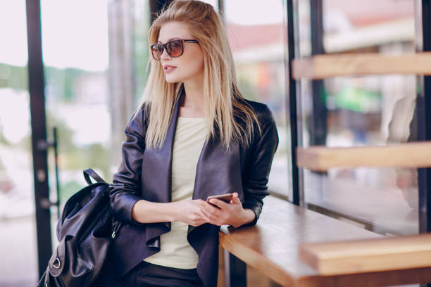 istock beautiful blonde on the street 667661064