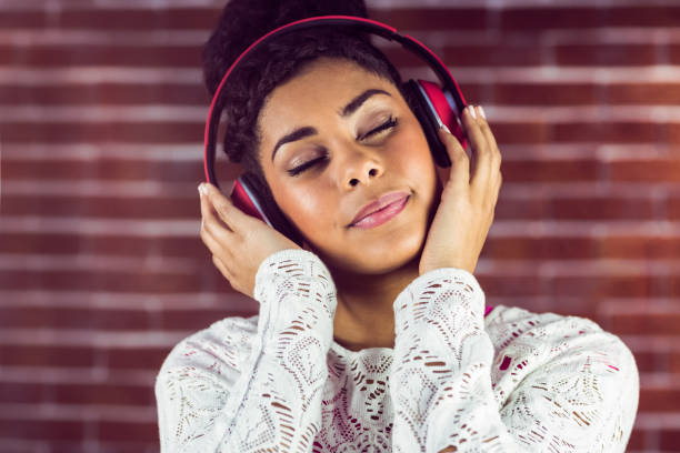 istock Young woman enjoying her music 667664020
