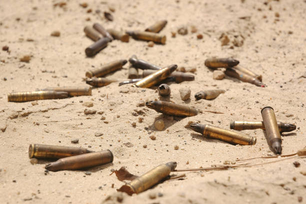 istock Spent Bullets in Iraqi Sand 667671294