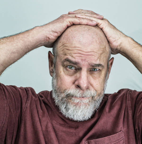 istock Concerned Considerate Senior Adult Man Listening 667672454