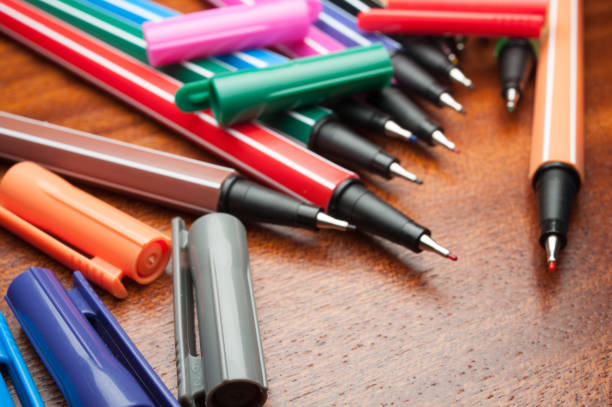 istock Colored marker pens on wood background. 667680080