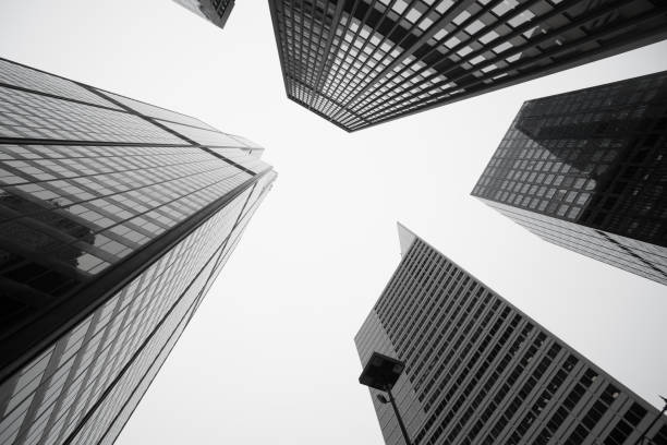 Towering Architecture and cityscapes of  five Chicago buildings rising skyward Illinois USA Black and white image towering Architecture and cityscapes of  five Chicago buildings rising skyward Illinois USA real estate office photos stock pictures, royalty-free photos & images
