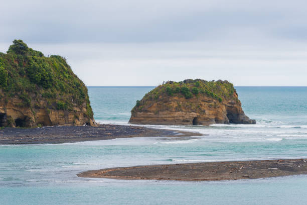istock Three Sisters and Elephant Rock, Taranaki, New Zealand. 667685432