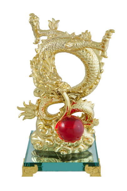 istock Golden dragon statue isolated on white background 667686132