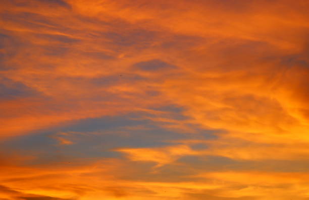 istock sky in sunset and motion cloud, beautiful colorful evening nature 667689258