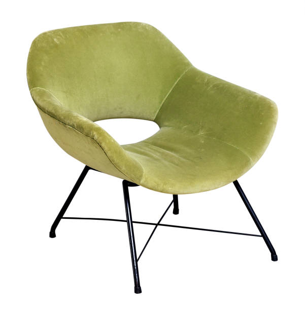 istock Green velvet chair on high legs 667689814