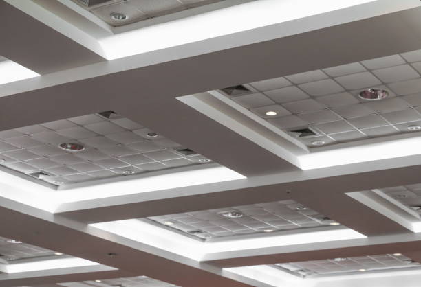 istock ceiling of business office building 667694108