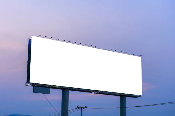 istock Blank billboard ready for new advertisement with sunset background 667694278