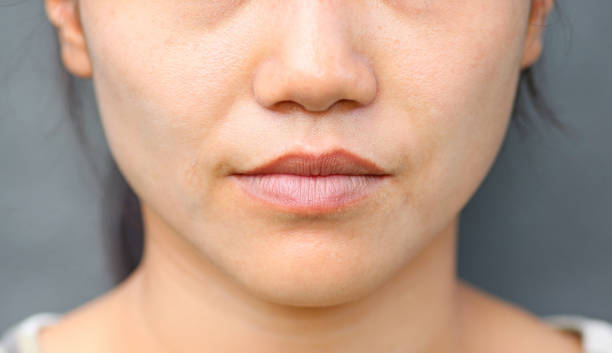 istock Asian girl mouth close up. 667697594