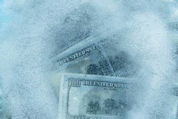 istock 100 dollars frozen melt. 667698278