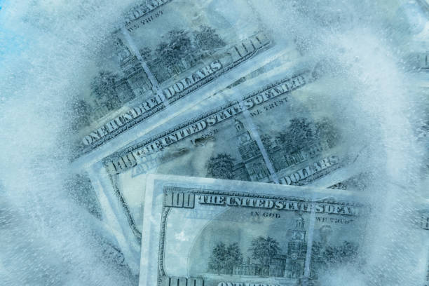 istock 100 dollars frozen melt. 667698350