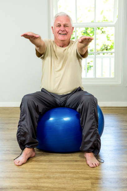 istock Portrait of senior man exercising 667708780