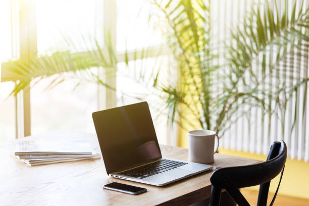 istock Professional at work. Top view ofman working on laptop while sitting at his working place. 667712074