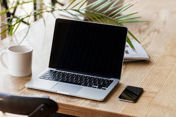 istock Professional at work. Top view ofman working on laptop while sitting at his working place. 667712200