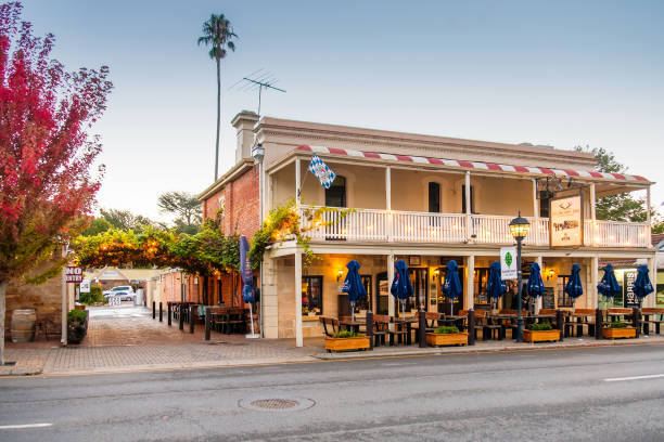Sydney, Australia - March 18, 2015: Patrons at the historic Clock Hotel at dusk, located on Crown St in Surry Hills.