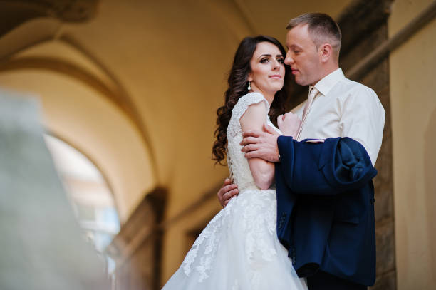 istock wedding couple background old city 667713136