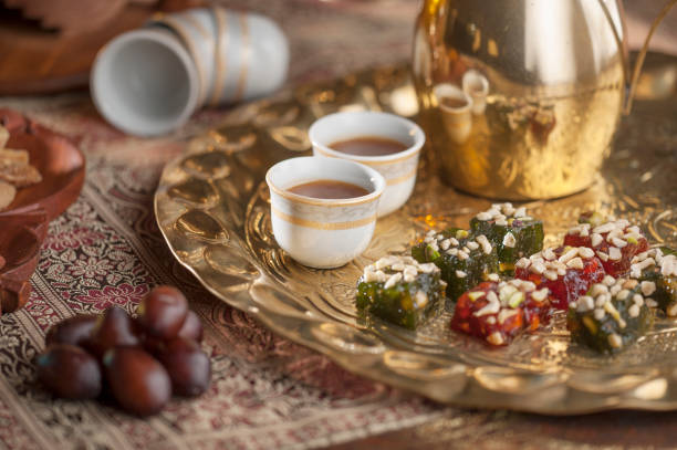 Traditional Arabian coffee, nuts and sweets served to guest at majlis