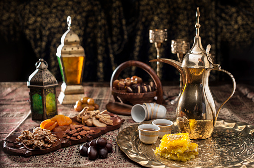 Dulces, frutos secos y café árabe tradicional photo