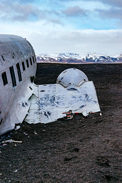 istock Abandoned Airplane At Beach Against Sky 667717805