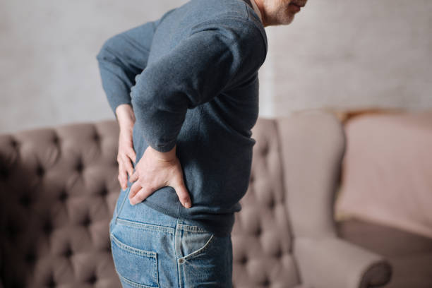 istock Back view of senior man with backache 667722276