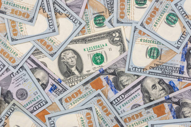 istock Pile of $100 dollar bills for background. 667731022