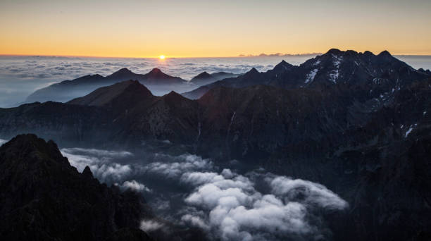 istock Sunrise in moutain from peak Rysy 667731108