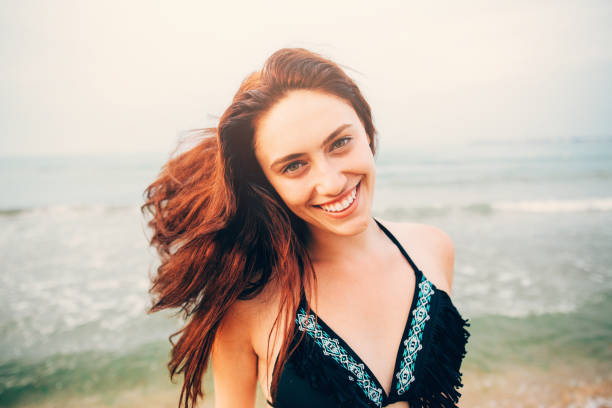 istock Woman at the beach 667743898