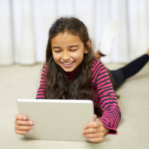 istock There's always something new to entertain her online 667748968