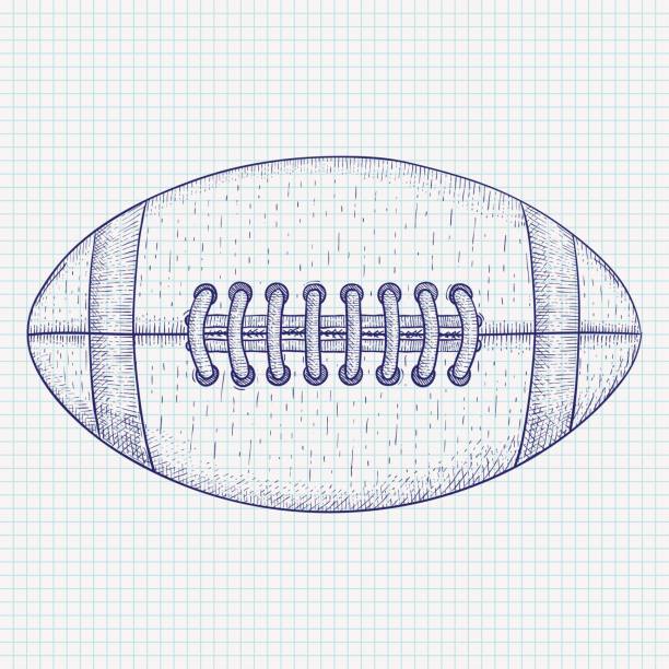 istock American football ball. Hand drawn sketch 667752432