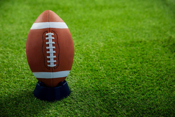 istock American football standing on holder 667754590