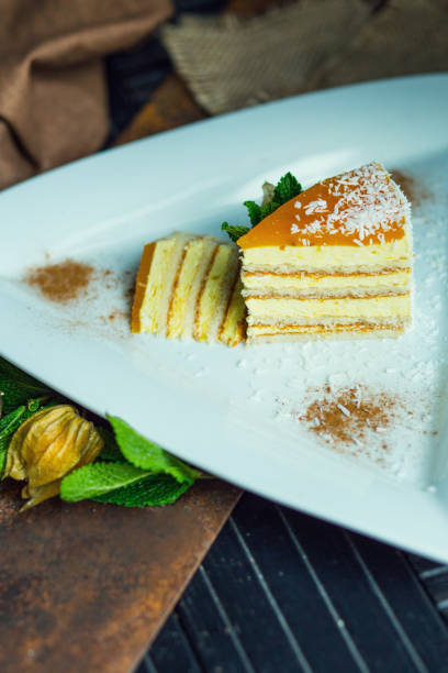 istock Fresh passion fruit cake with coconut and cinnamon. Dessert on plate. The restaurant or cafe atmosphere 667758812