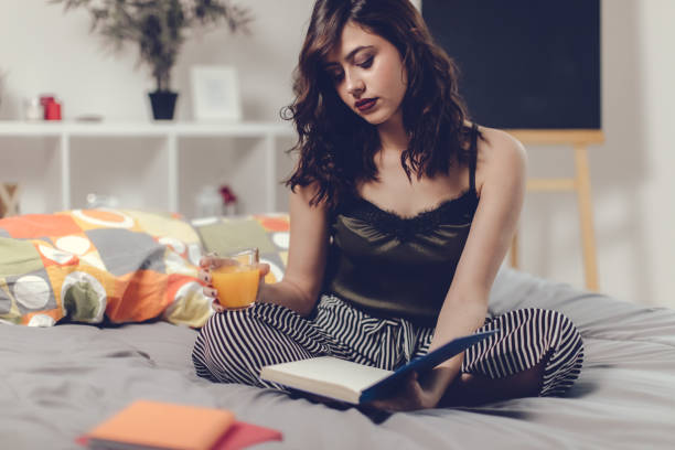 istock Beautiful young woman at home 667760244