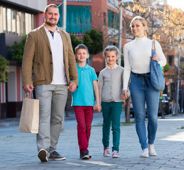 istock Family taking a walk in town 667764100