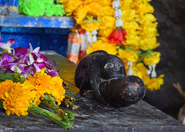 istock Religious Offerings By Statue At Shrine 667765863
