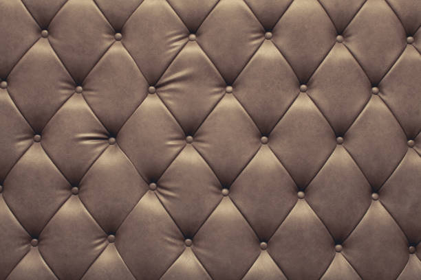istock background surface of leather sofa with vintage color style. 667767390