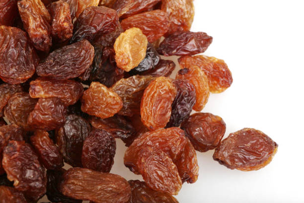 istock raisins isolated on white background 667771290