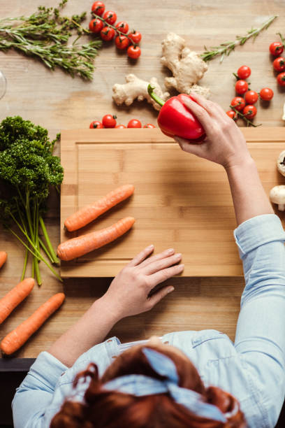 istock Woman preparing salad 667774448
