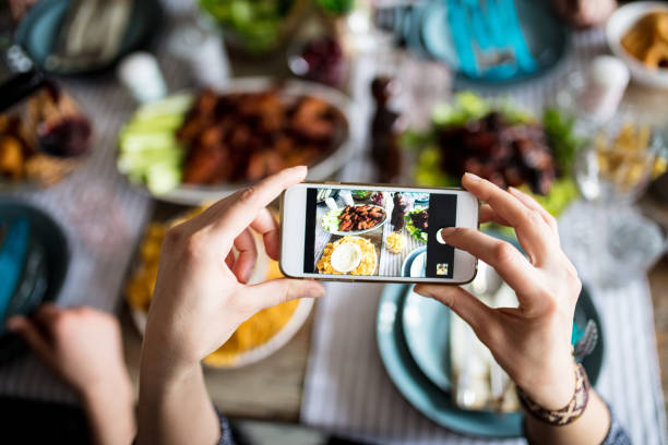 istock Hipster making a memory of his meal 667775224