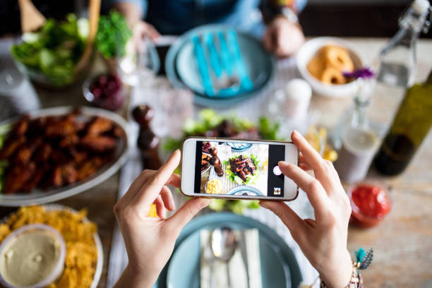 istock Hipster taking photo for social media before eating it 667778326
