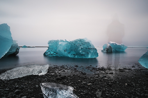 Ice Beach at Jokulsarlon glacier lagoon with spirit standing alone