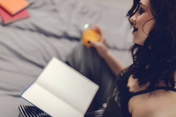 istock Beautiful young woman at home 667790740