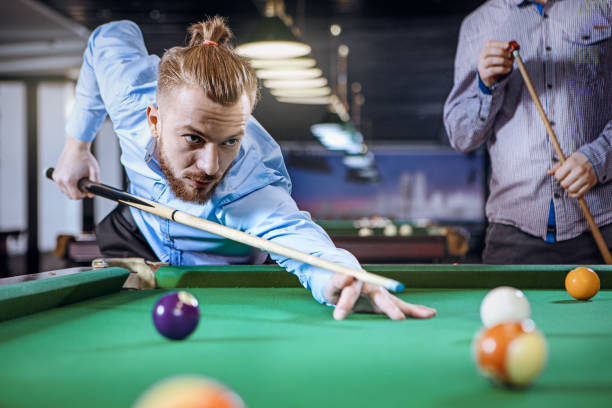 istock Young man is preparing to hit the ball 667791176