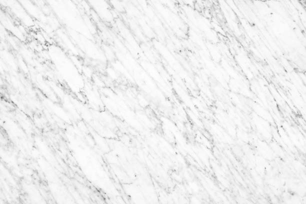 istock White Carrara Marble natural light surface for bathroom or kitchen countertop 667802036
