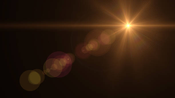 istock Lens Flare light over Black Background. Easy to add overlay or screen filter over photos 667802106