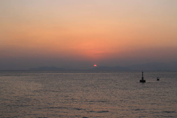 istock West Lamma Channel of sunset 667802208