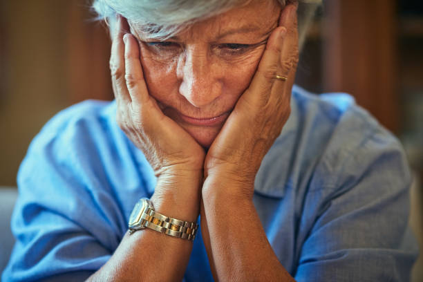 Feeling dread and depression dawn on her Cropped shot of a senior woman looking worried alzheimer's disease stock pictures, royalty-free photos & images