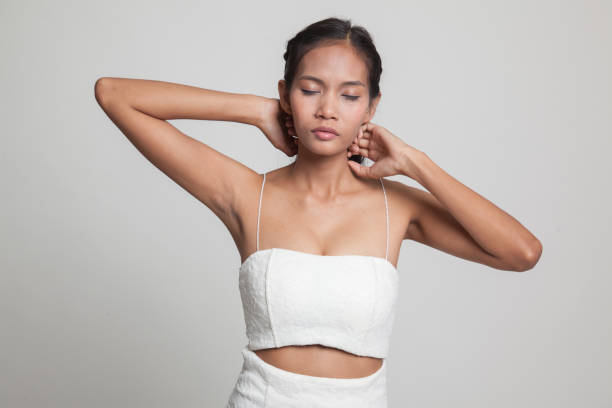 istock Sleepy young Asian woman yawn. 667802522