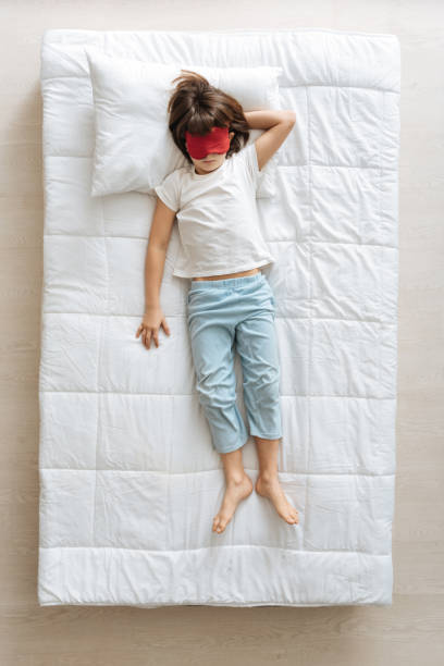 istock Funny cute boy sleeping in the morning 667803180