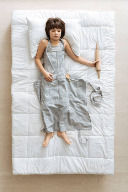istock Imaginative little guy thinking about his job 667806312